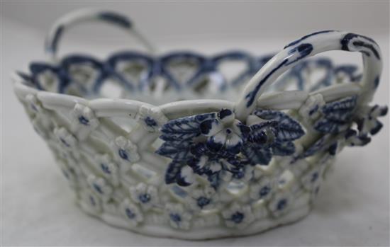 A Worcester Pine Cone pattern oval twin handled basket. c.1775, width 19cm, small losses to flowers